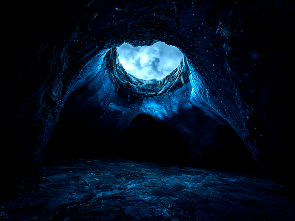 the inside of a dark ice cav